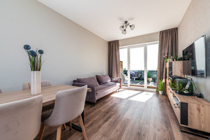 Nowoczesny segment z garażem i ogródkiem 105,09m2
